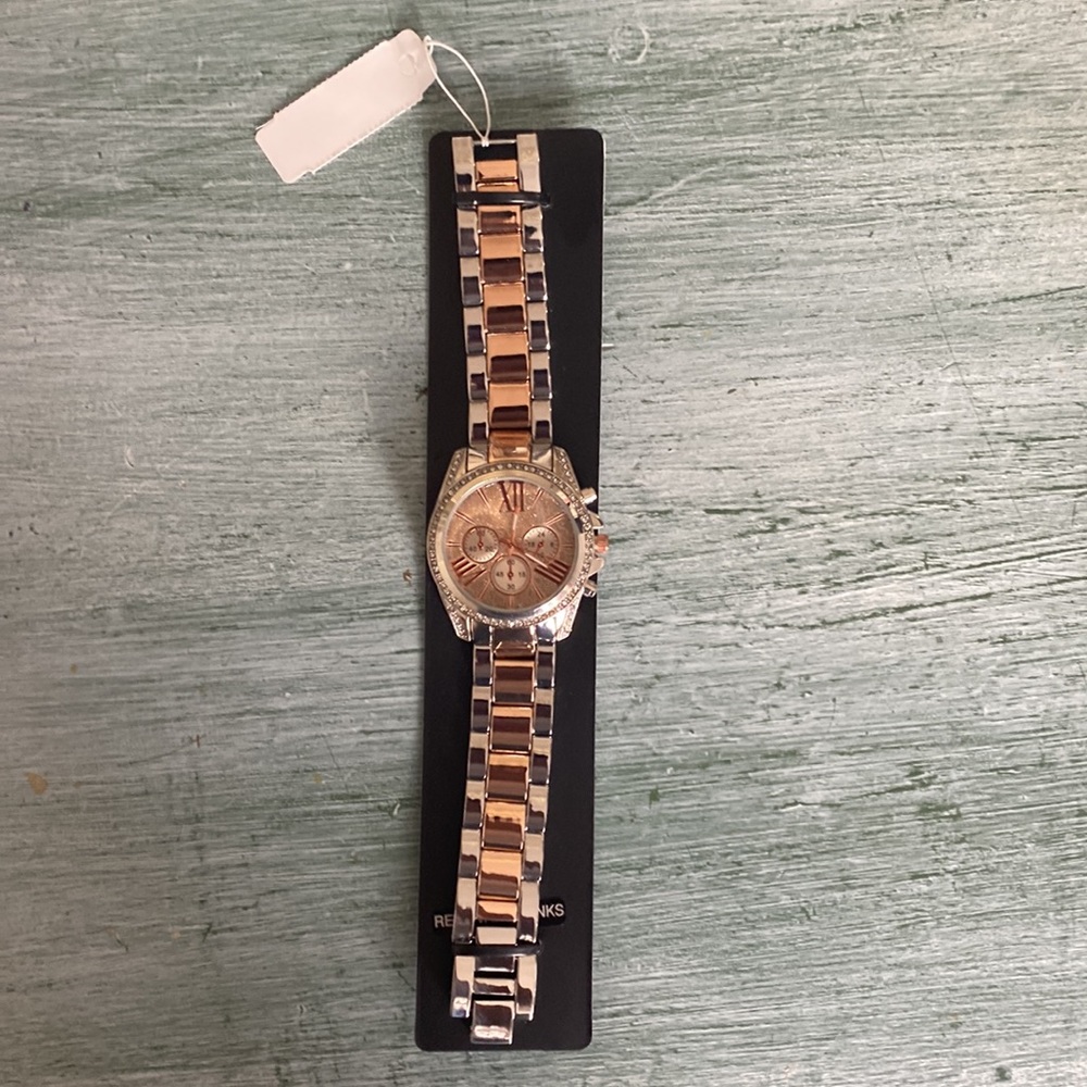 Rose Gold And Silver Watch